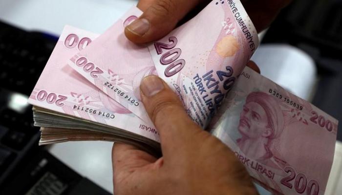 عملات ورقية من الليرة التركية - رويترز