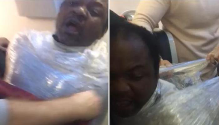 الكاميروني إيمانويل فوسو بعد تغليفه بشرائط بلاستيكية