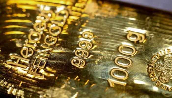 خطط التحفيز تشعل الصراع بين الذهب والدولار