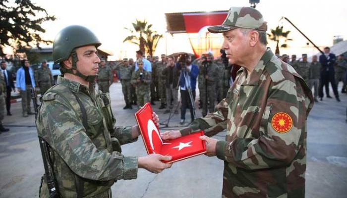 أردوغان بالزي العسكري في هاتاي الحدوية مع سوريا - أرشيفية