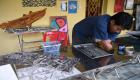 كمبودي مبتور اليدين يصل برسوماته إلى العالمية