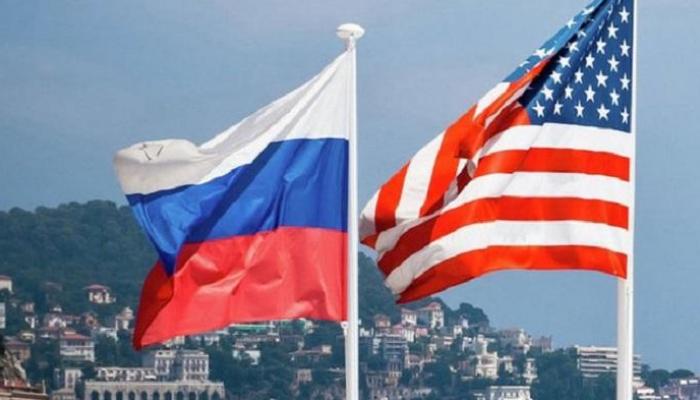العلمان الأمريكي والروسي 