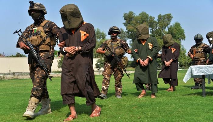 عملية سابقة للأمن الأفغاني يلقي خلالها القبض على عناصر داعش - أ.ف.ب