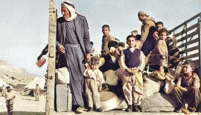 إحدى الصور الملونة لهجرة عائلات فلسطينية خلال النكبة