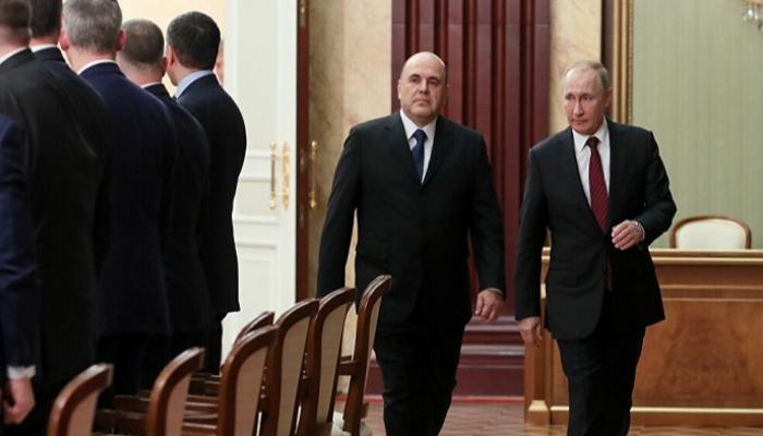 بوتين وميشوستين في طريقهما لأحد الاجتماعات - أرشيفية