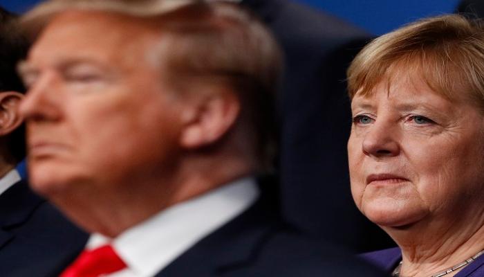  المستشارة الألمانية أنجيلا ميركل والرئيس الأمريكي دونالد ترامب - أ.ف.ب