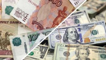 أكبر تراجع للدولار أمام العملات خلال 3 أشهر