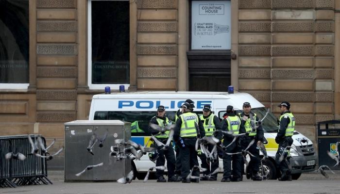 عناصر من الشرطة الاسكتلندية في جلاسجو - رويترز