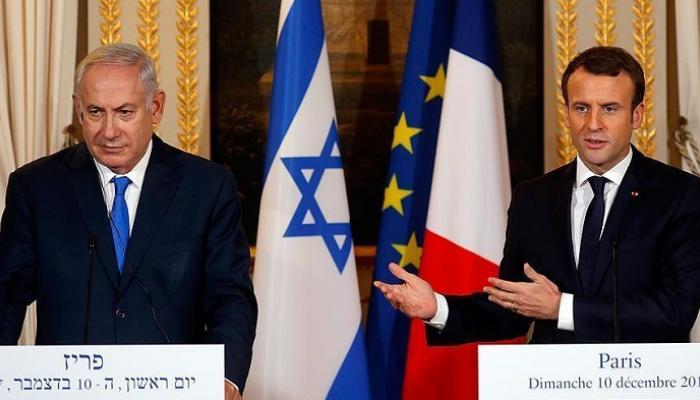 الرئيس الفرنسي ورئيس وزراء إسرائيل خلال لقاء سابق