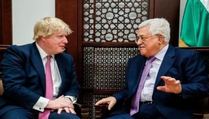 الرئيس الفلسطيني ورئيس وزراء بريطانيا خلال لقاء سابق