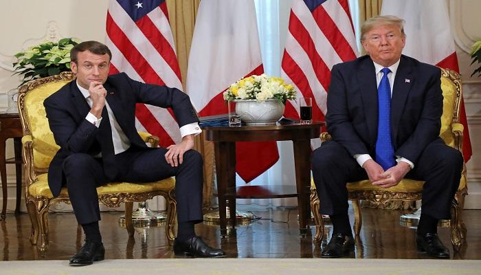 الرئيس الأمريكي ونظيره الفرنسي خلال لقاء سابق - أ.ف.ب
