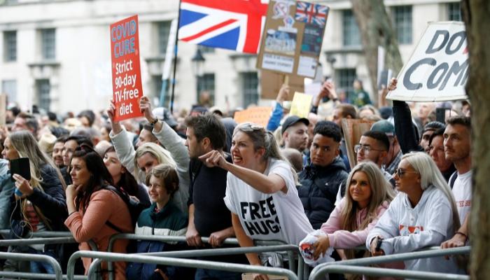 متظاهرون في العاصمة البريطانية ضد إجراءات احتواء فيروس كورونا