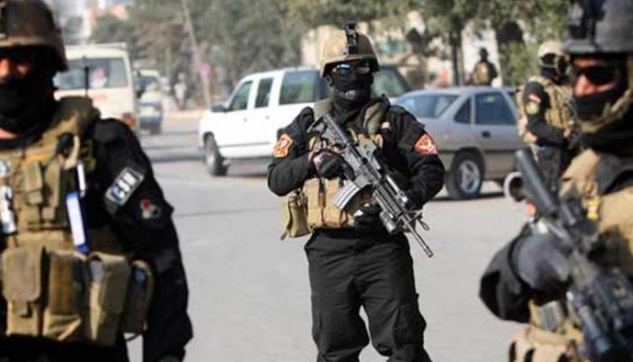 عناصر من الشرطة العراقية في مهمة أمنية ببغداد - إرشيفية