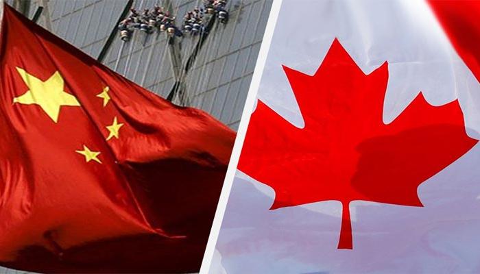 أعلام الصين وكندا - أرشيفية