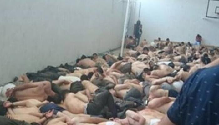 محتجزون في أحد مراكز الاعتقال بتركيا - نورديك مونيتور