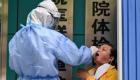 الصين تحذر من أحدث انتشار لفيروس كورونا.. سلالة "دلتا" متهم رئيسي