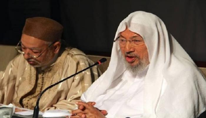 يوسف القرضاوي وراشد الغنوشي في لقاء سابق- أرشيفية