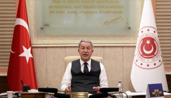 وزير الدفاع التركي خلال الاجتماع