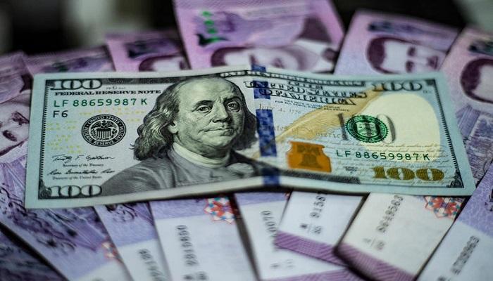 عملات من الليرة السورية والدولار الأمريكي