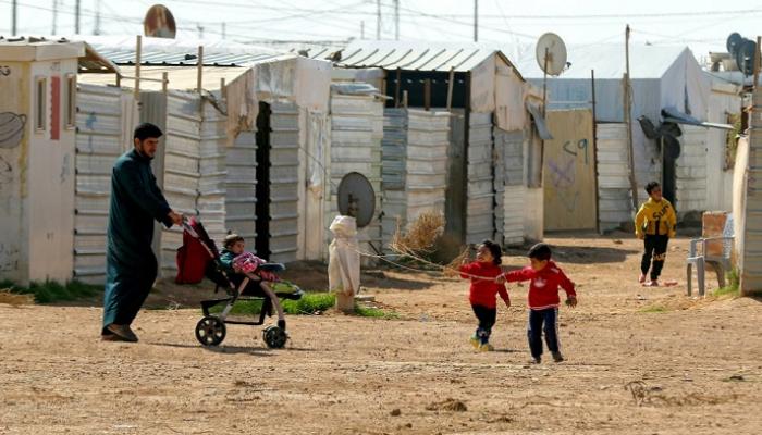 أطفال يلعبون في مخيم الزعتري للاجئين شمال العاصمة الأردنية عمّان