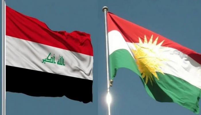 علم العراق بجانب علم إقليم كردستان