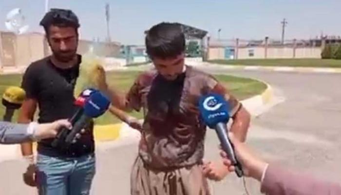 اللاجئ الإيراني قبيل حرق نفسه في أربيل