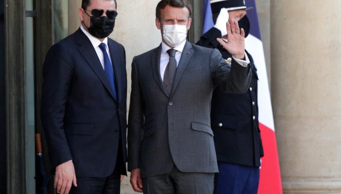 الرئيس الفرنسي إيمانويل ماكرون خلال لقاء عبد الحميد الدبيبة
