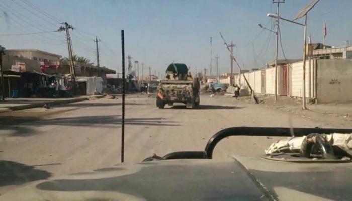 عربات عسكرية عند منطقة الطارمية شمالي بغداد