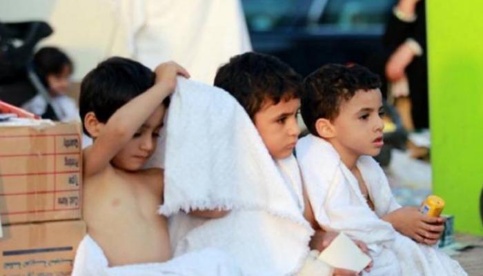 أطفال يتواجدون مع أسرهم خلال الحج - صورة أرشيفية