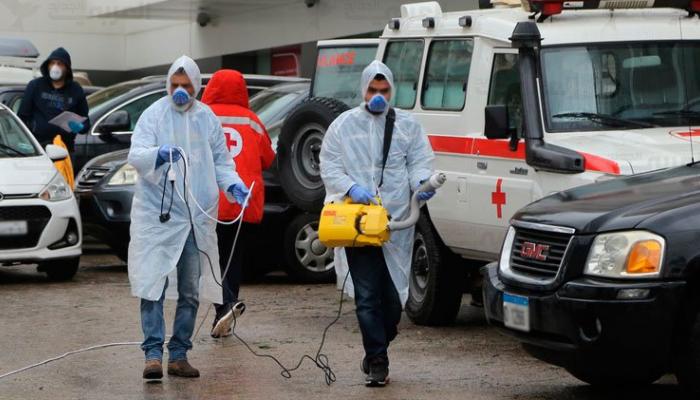 عمليات تعقيم في لبنان لاحتواء انتشار فيروس كورونا