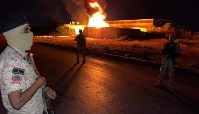 عناصر من المليشيات خلال هجومها على بني وليد
