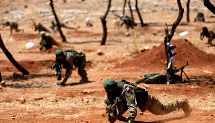 عناصر جبهة تحرير الشام خلال تدريبات - المرصد السوري