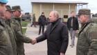 بوتين يحمل كلاشينكوف.. تفقد "التعبئة" وشارك بالرماية (صور)