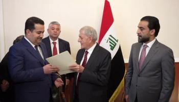 السوداني خلال تسلم خطاب التكليف من رئيس العراق