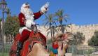 "الوحيد المعتمد في القدس".. بابا نويل الفلسطيني ينشر البهجة بالشوارع