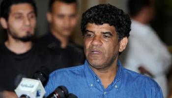 السنوسي عقب القبض عليه في 2011 (أرشيفية)