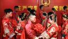 گزارش تصویری | برگزاری مراسم عروسی هزاران زوج چینی در تاریخ ۲۲/۰۲/۲۰۲۲ 