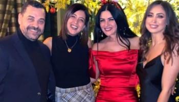 نيكول سعفان إلى يمين الصورة وطارق العريان في يسارها