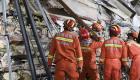 23 عالقا وعشرات المفقودين.. كارثة انهيار مبنى وسط الصين (صور)