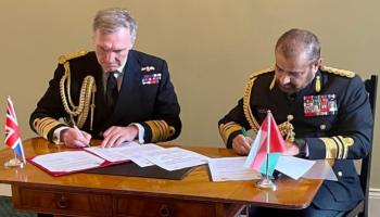 جانب من توقيع  اتفاقية الدفاع المشترك 