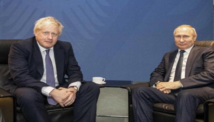 الرئيس الروسي خلال لقاء سابق مع رئيس وزراء بريطانيا
