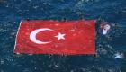 62 dalgıçla dev Türk bayrağı denize açıldı