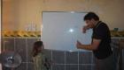 "يد الرحمة".. شاب عراقي يحول منزله لمركز لتعليم مصابي متلازمة داون