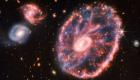مجرة "عجلة العربة".. صور مذهلة من الفضاء العميق (فيديو)