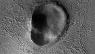 دهانه‌ای به شکل «گوش انسان»؛ جدیدترین تصاویر ناسا از مریخ