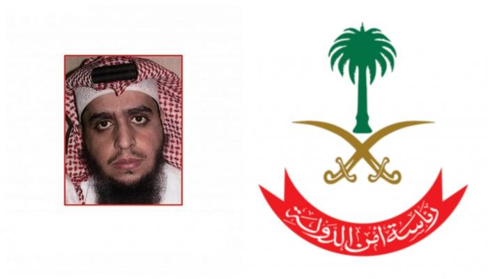 شعار رئاسة أمن الدولة في السعودية مع صورة للمطلوب الأمني