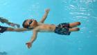 مهارت خارق‌العاده کودک ایرانی که بدون پا شنا می‌کند
