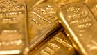 أسعار الذهب تتراجع مع عودة الزخم للدولار القوي