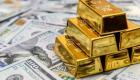 بريق الذهب يتحدى "المركزي الأمريكي".. والدولار يخالف التوقعات