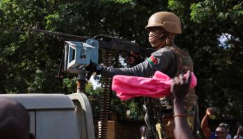 جندي بوركيني فوق آلية عسكرية - أرشيفية